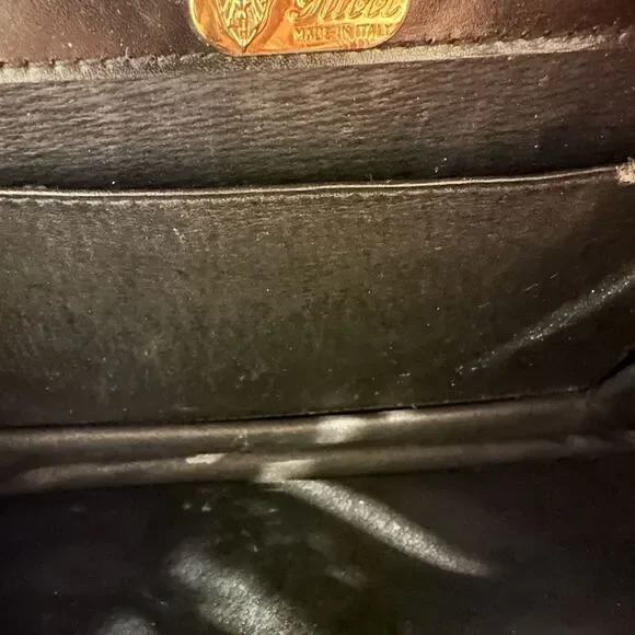 Gucci Black and Gold Leather Clutch